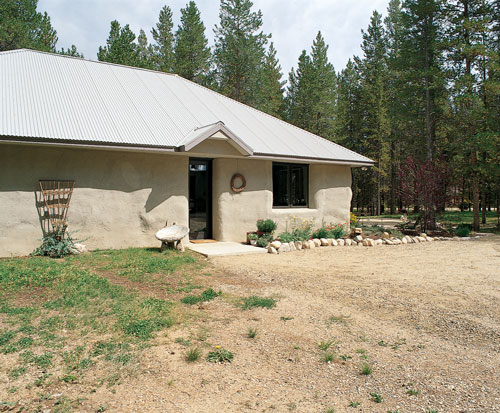 
The metal roof is hipped so that its weight is distributed evenly over all four walls of the house.
